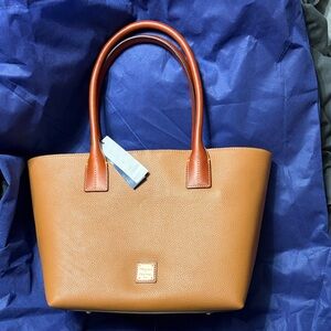 Dooney & Bourke
Pebble Leather Small Russle Tote Caramel NWT and dust bag